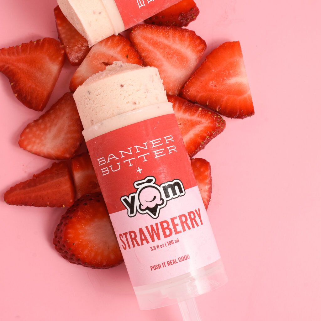 strawberry ice cream push pops with sliced strawberries